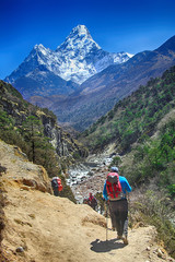 Fototapeta na wymiar Goup of climbers in action, view on the Himalayas peak Ama Dablam, Nepal