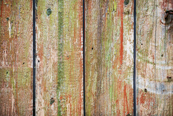 Vintage wood texture with peeling paint. Old weathered wooden boards background.