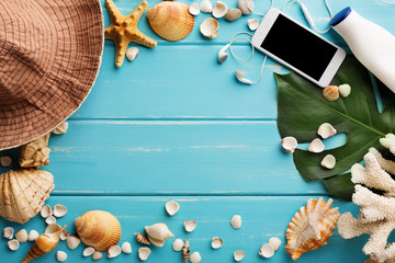 Vacation background on blue wood, top view with copy space