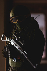 Strikeball player with machine gun