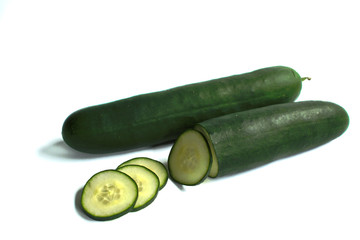 Closeup of cucumbers on a white background