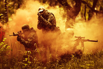 Officers on fire amidst smoke