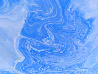 Marbled blue abstract background. Liquid marble pattern