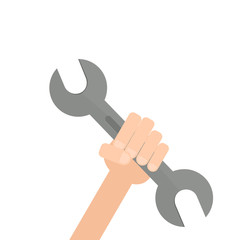 Hand holding spanner