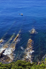 MARE IN LIGURIA CON SCOGLI E BARCA ITALIA ITALY