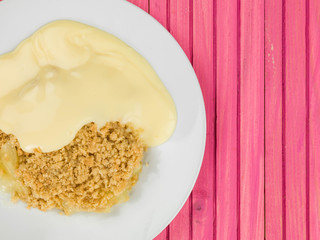 Apple Crumble Dessert Served With Hot Custard