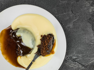 Sticky Toffee Pudding Dessert Served With Hot Custard