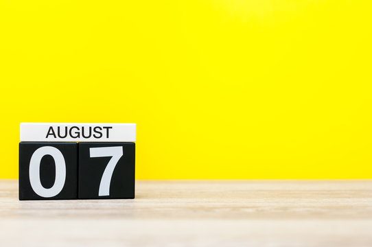 August 7th. Image of august 7, calendar on yellow background with empty space for text. Summer time