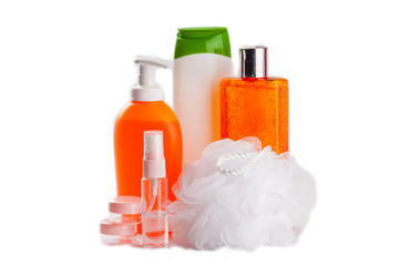 isolated  shampoo, shower gel, loofah on a white background
