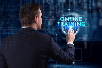 Business, Technology, Internet and network concept. Young businessman working on a virtual screen of the future and sees the inscription: Online training