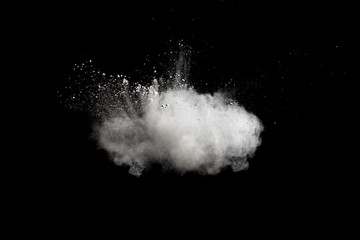 Abstract design of white powder cloud against dark background
