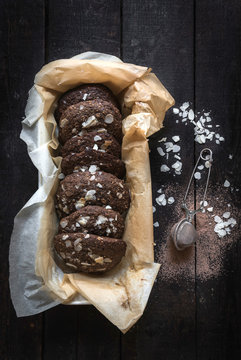 Chocolate and oats cookies on wooden background