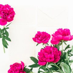 Vintage composition with flowers and paper cards on white background. Flat lay, top view.