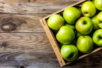 Box of fresh green apples. Harvest concept. Top view