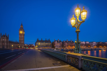 Fototapeta na wymiar London, England - The Big Ben and the Houses of Parliament with street lamp taken from westminster bridge at dusk