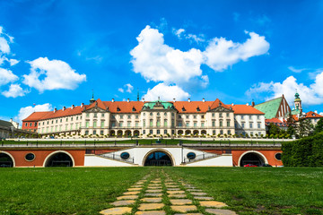 Obraz premium The royal castle in Warsaw. View from the back side. Sunny summer day with a blue sky. Horizontal photo.