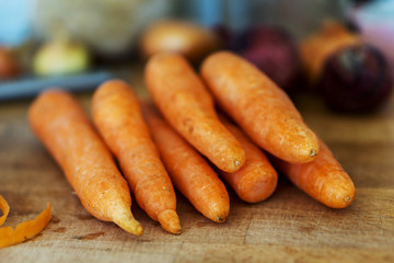 Close up of fresh, mature carrots. Rich in vitamins and minerals. Shallow depth of focus.