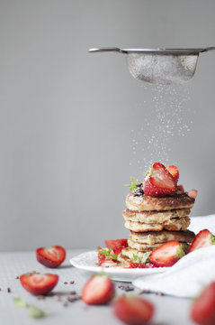 Banana Pancakes with Strawberry Topping (Powdered Sugar)