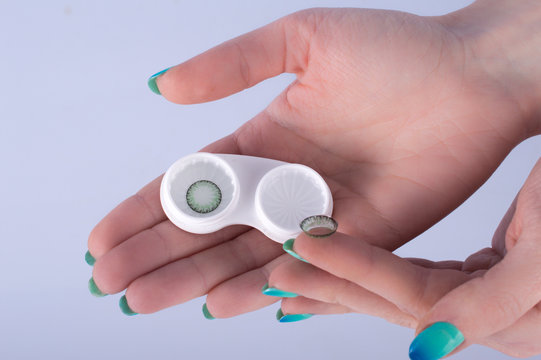 Contact Lens on a finger