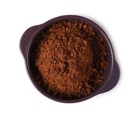 pile cocoa powder and porcelain bowl isolated on white background