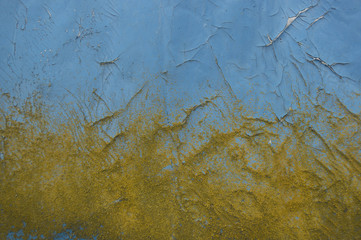 surface of blue colour with cracks and a mould