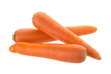fresh carrots with slices of carrot on the white background