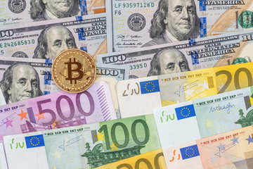 Fototapeta na wymiar Litecoin and bitcoin with dollar and euro bills. business concept