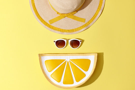 Fashion Sunny Summer Woman Set. Trendy Accessories. Glamor Lemon Citrus Clutch, fashion Sunglasses on Yellow. Hot Beach summer Vibes. Creative Bright Style. Vanilla Pastel Color. Minimal, Art