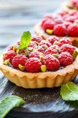 Tartlets with chocolate and fresh raspberries