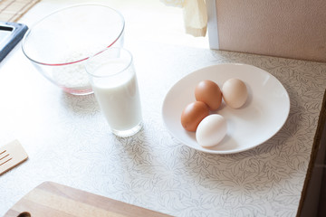 kitchen table milk eggs flour products