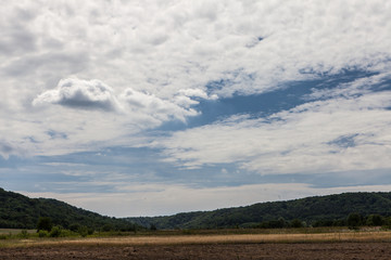 Rural scene with pretty cloudy sky