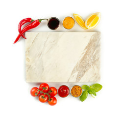 Marble board, different sauces and vegetables on white background