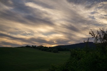 Naklejka na ściany i meble Colorful sunset on meadow. Slovakia