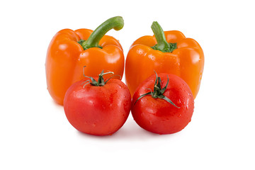 tomatoes and peppers on isolated background