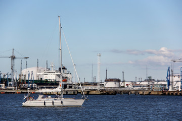 Fototapeta na wymiar ship coming to marina Latvia, Ventspils