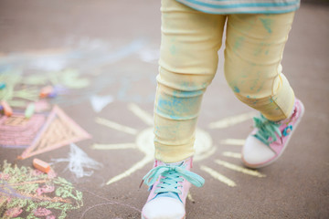 Drowing with chalk outdoors