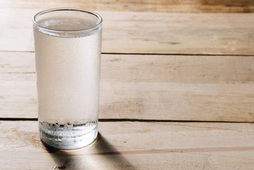 Cold water in a glass of water