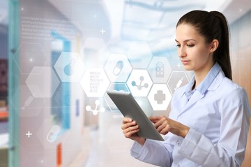 Doctor work on digital tablet.