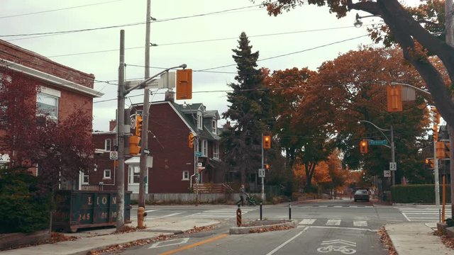 Establishing shot of a typical street corner in Toronto, Ontario