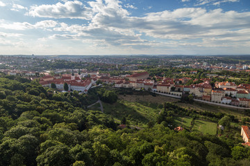 View of Petrin Hill, Strahov Monastery and other old buildings in Prague, Czech Republic, from above.