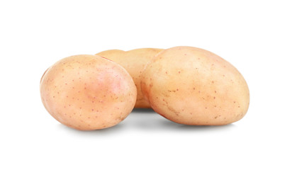 Raw unpeeled potatoes on white background