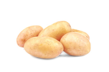 Raw unpeeled potatoes on white background