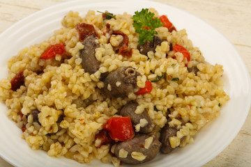 Bulgur with chicken hearts