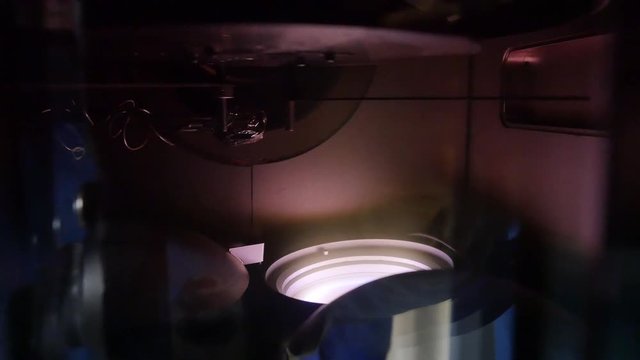 Old slide projector light path. Unit the light inside close up