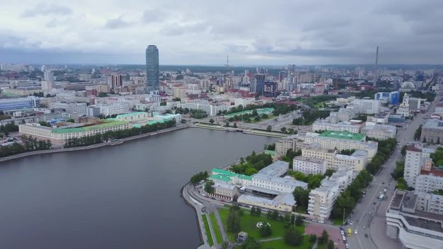 Bird's eye view of city, modern buildings, city river. Beautiful city aerial view