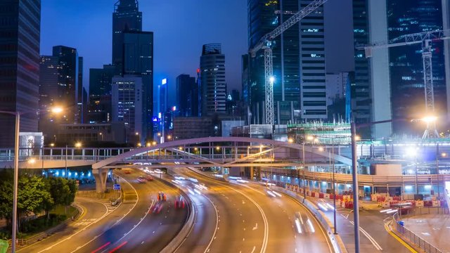 Modern asian city heavy traffic street highway at night 4k time lapse. Gloucester Road, Hong Kong, January 2016