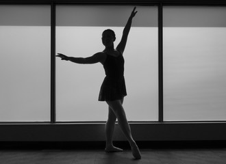 Black and White version of Ballet dancer Silhouette in a Window frame