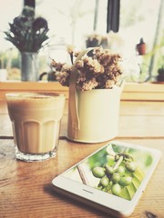 Smart phone with coffee cup