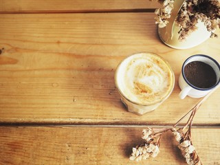 Coffee with milk and dried flowers