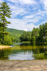 Mountain pond with kayak